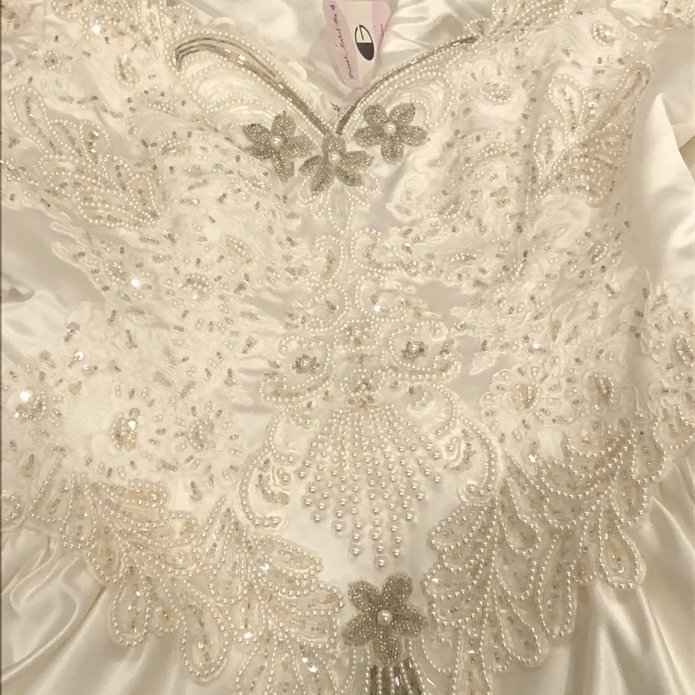 Brand new wedding dress never worn.